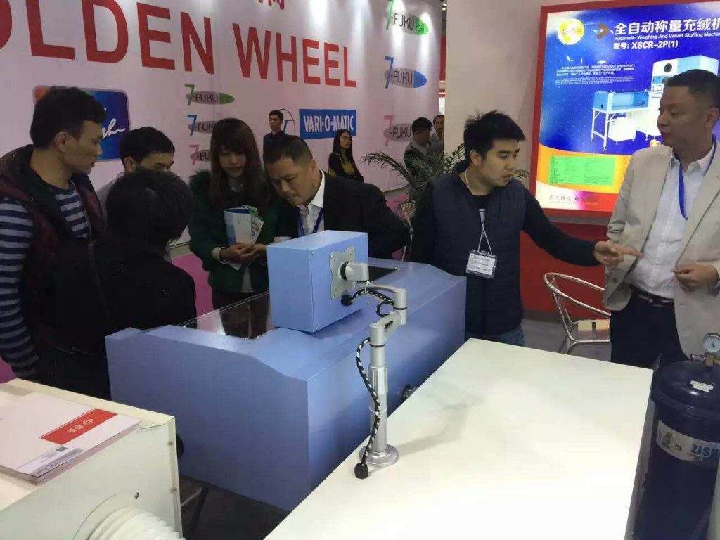 XIDO machine show in DONGGUAN exhibition，clients are very interest in down filling machine scr-2p-8g